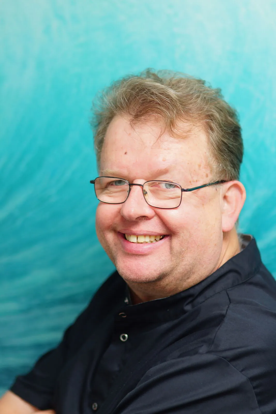 Porträt von Zahnarzt Tankred Bert Schlicke
